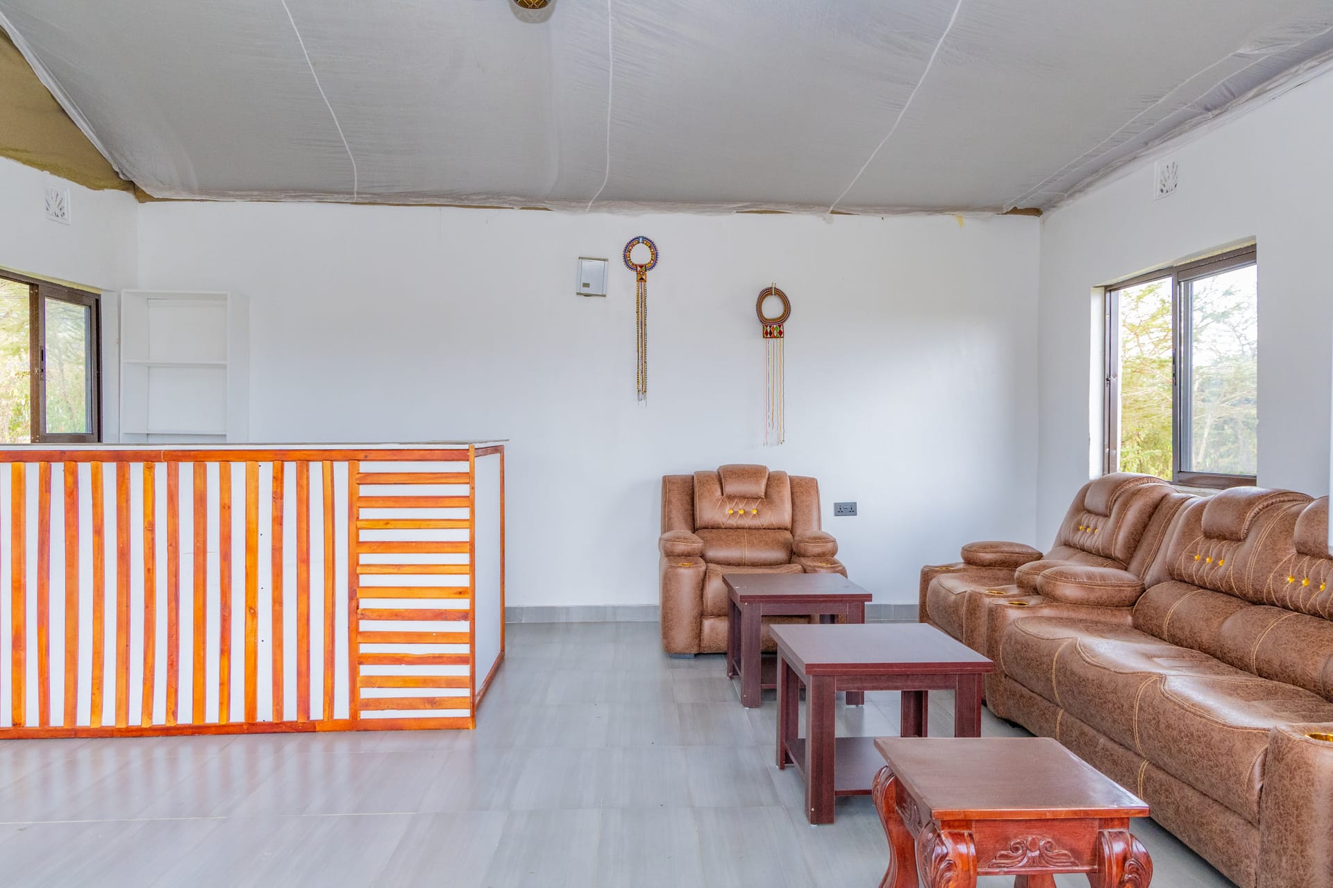 Warm lounge and reception welcome at Oltukai Mara Camp