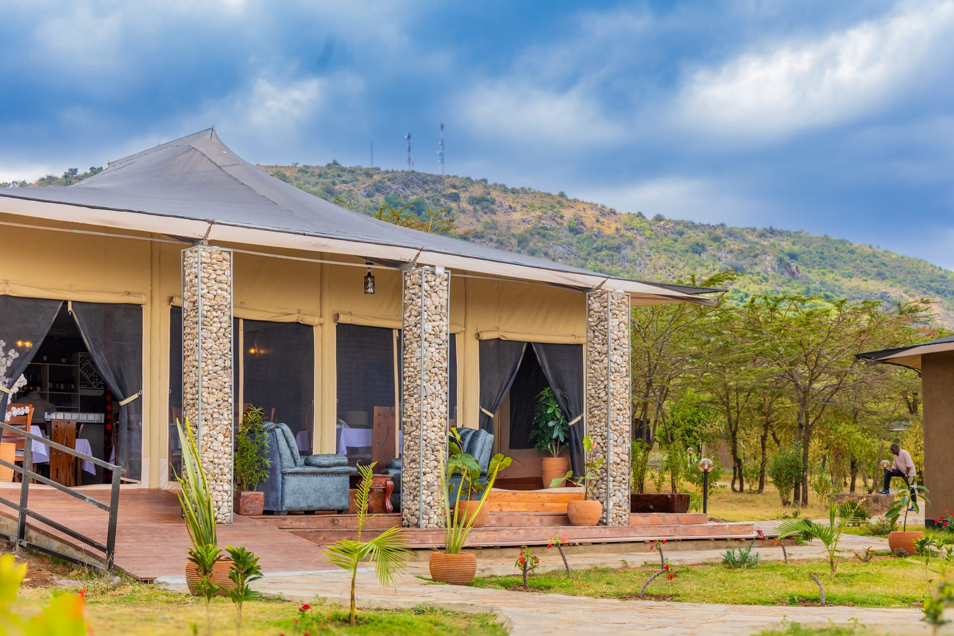 Intimate lounge atmosphere with soft light at Oltukai Mara Camp